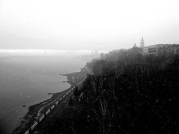 A black and white image of the Russian city of Perm on the high, steep banks of the Kama River 
